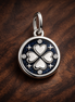 Navy Clover Night Charm - Navy Four-Leaf Clover Moon Charm — display on walnut