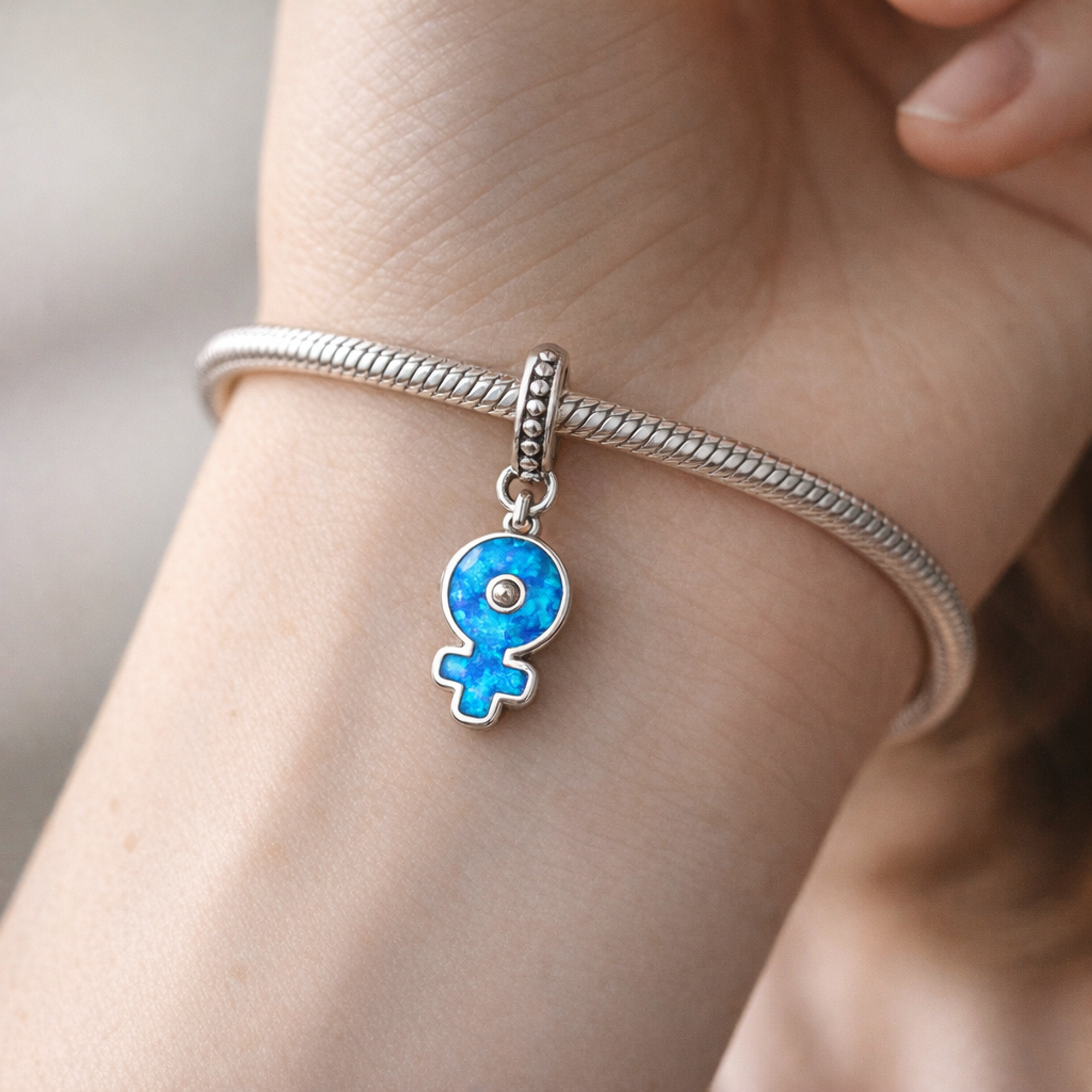 Female Symbol Evil Eye Charm - Blue Evil Eye Female Symbol Charm — worn on wrist