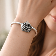 Vintage Cruise Ship Charm - Vintage Cruise Ship Charm — worn on wrist