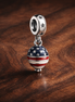 Patriotic Balloon Dangle - Patriotic Balloon Dangle Charm — display on walnut