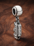 London Landmark Dangle Charm - London Landmark Dangle Charm — display on walnut