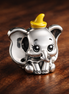 Disney Dumbo Charm — display on walnut