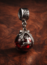 Haunted Story Dangle Charm - Haunted Story Dangle Charm — display on walnut