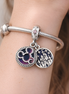 Disney 100 Medallion Charm - Disney 100 Medallion Charm — worn on wrist