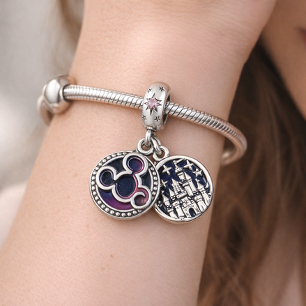 Disney 100 Medallion Charm - Disney 100 Medallion Charm — worn on wrist