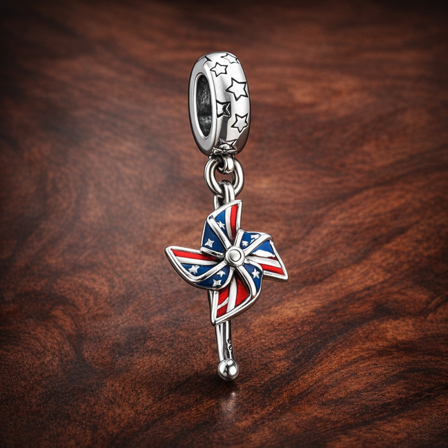 Union Jack Pinwheel Charm - Union Jack Pinwheel Charm — display on walnut