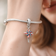Union Jack Pinwheel Charm - Union Jack Pinwheel Charm — worn on wrist