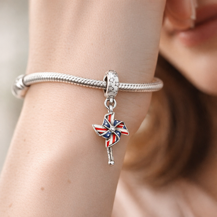 Union Jack Pinwheel Charm - Union Jack Pinwheel Charm — worn on wrist