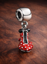 Minnie-Inspired Polka Dot Dress Charm - Minnie-Inspired Polka Dot Dress Charm — display on walnut