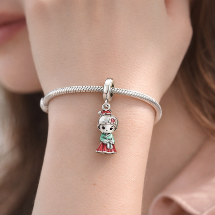 Holiday Doll Trio Dangle - Holiday Doll Trio Dangle Charm — worn on wrist
