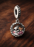 Sugar Skull Floral Charm - Sugar Skull Floral Charm — display on walnut