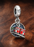 Red Cable Car Charm - Red Cable Car Charm — display on walnut
