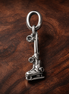 Skateboard and Ruler Charm - Skateboard and Ruler Charm — display on walnut
