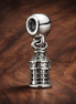 Silver Pagoda Landmark Charm - Silver Pagoda Landmark Charm — display on walnut
