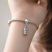 Silver Pagoda Landmark Charm - Silver Pagoda Landmark Charm — worn on wrist