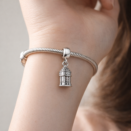 Silver Pagoda Landmark Charm - Silver Pagoda Landmark Charm — worn on wrist