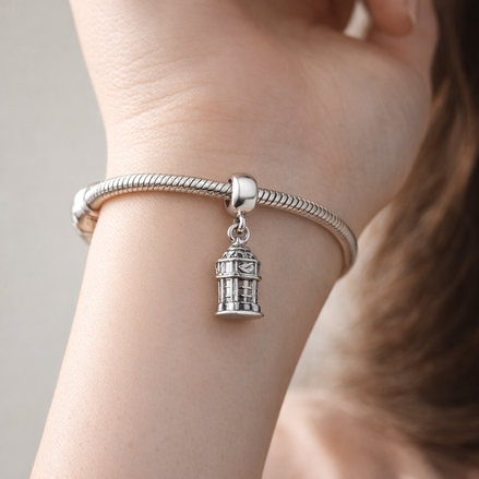 Silver Pagoda Landmark Charm - Silver Pagoda Landmark Charm — worn on wrist