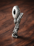 Silver Feather Quill Charm - Silver Feather Quill Charm — display on walnut