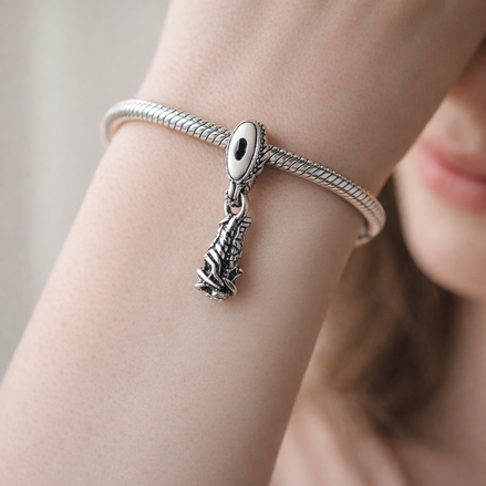 Silver Feather Quill Charm - Silver Feather Quill Charm — worn on wrist