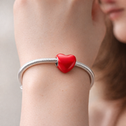 Color-changing Hidden Message Heart Charm — worn on wrist