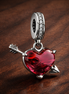 Arrow Through Heart Charm - Arrow Through Heart Charm — display on walnut