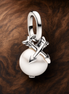 Mickey Mouse Dangle Charm - Mickey Mouse Dangle Charm — display on walnut