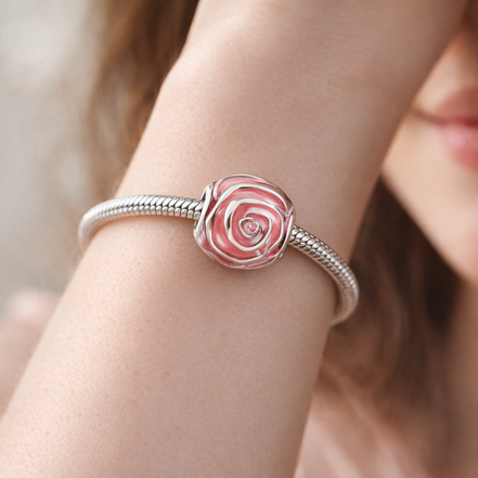 Pink Rose in Bloom Charm — worn on wrist