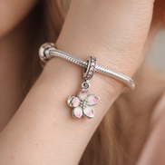 Cherry Blossom Dangle Charm — worn on wrist