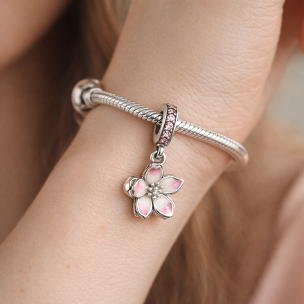 Cherry Blossom Dangle Charm — worn on wrist