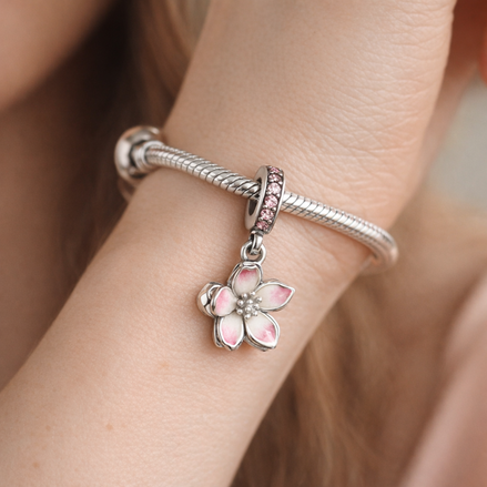 Cherry Blossom Dangle Charm — worn on wrist