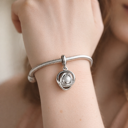 Clear Eternity Circle Dangle Charm — worn on wrist