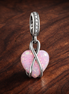 Mom Opalescent Heart Dangle Charm — display on walnut