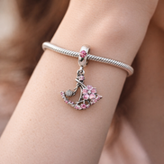 Minnie-Inspired Swing Charm - Minnie-Inspired Swing Charm — worn on wrist