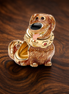 Grogu Rose Gold Plated Figure Charm - Grogu Rose Gold Plated Figure Charm — display on walnut