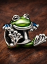 Climbing Frog Charm — display on walnut