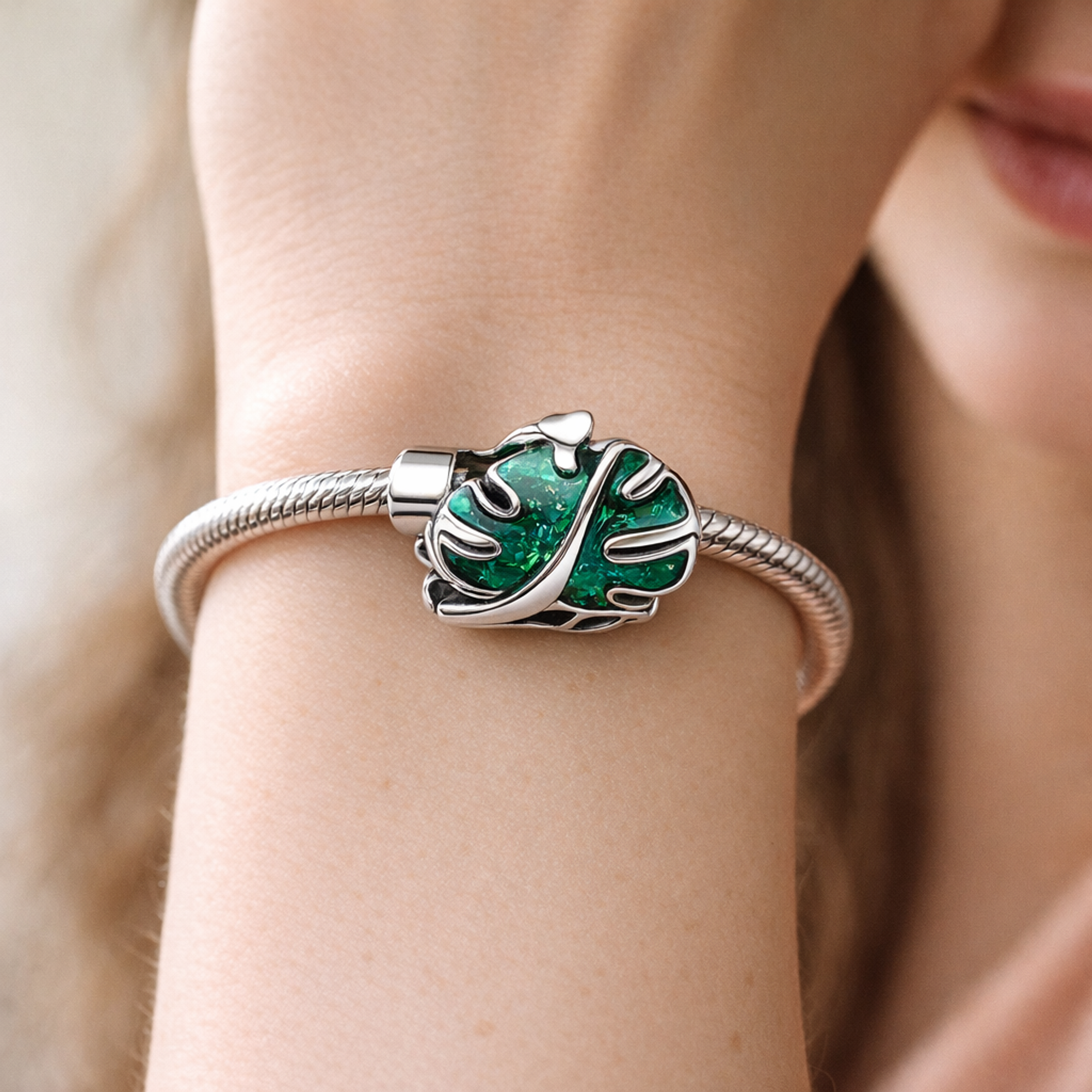 Green Monstera Leaf Charm - Green Monstera Leaf Charm — worn on wrist