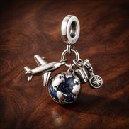 Airplane Passport Globe Charm - Airplane Passport Globe Charm — display on walnut