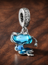 Blue Frog Charm - Blue Frog Charm — display on walnut