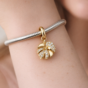 Sparkling Monstera Leaf Dangle Charm — worn on wrist