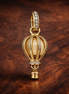 Sparkling Clear Hot Air Balloon Dangle Charm — display on walnut