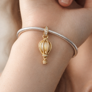 Sparkling Clear Hot Air Balloon Dangle Charm — worn on wrist