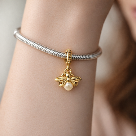 Gold Plated Flower Dangle Charm - Gold Plated Flower Dangle Charm — worn on wrist