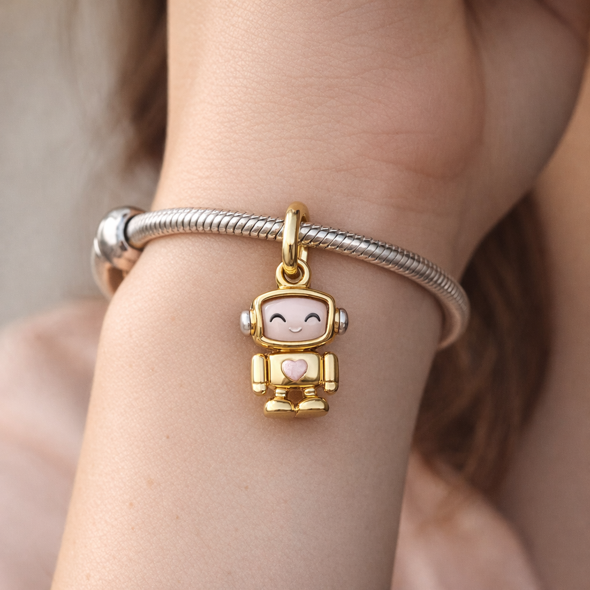 Spinnable Face Robot Dangle Charm — worn on wrist