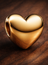 Be Love Engravable Heart Charm — display on walnut