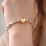 Be Love Engravable Heart Charm — worn on wrist