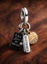 Friendship Triple Dangle Charm — display on walnut