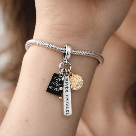 Friendship Triple Dangle Charm — worn on wrist
