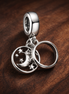 Family Moon Disc - Family Moon Disc Charm — display on walnut