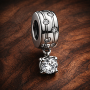Clear Square Crystal Dangle Charm - Clear Square Crystal Dangle Charm — display on walnut