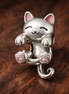 Sleepy White Cat Charm - Sleepy Cat Charm — display on walnut